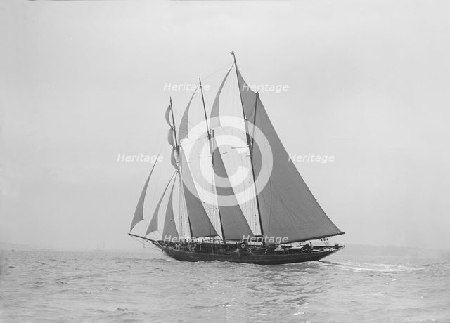 The auxiliary schooner 'La Cigale' sailing close-hauled, 1913. Creator: Kirk & Sons of Cowes.