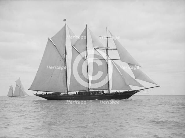 The auxiliary schooner 'La Cigale' sailing close-hauled, 1913. Creator: Kirk & Sons of Cowes.