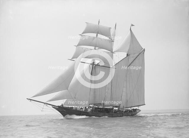The auxiliary schooner 'La Cigale' sailing close-hauled, 1913. Creator: Kirk & Sons of Cowes.