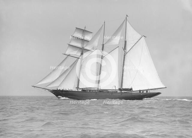 The auxiliary schooner 'La Cigale' sailing close-hauled, 1913. Creator: Kirk & Sons of Cowes.