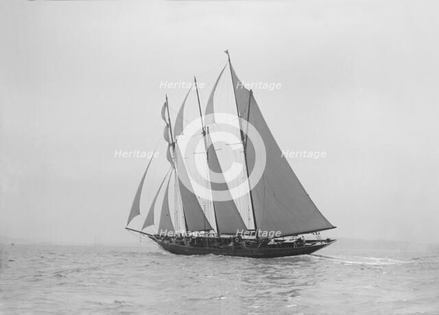 The auxiliary schooner 'La Cigale' sailing close-hauled, 1913. Creator: Kirk & Sons of Cowes.