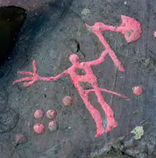 The Axe God, Bronze Age petroglyph at Flyhov, Husaby, Sweden. Creator: Åke Lindau