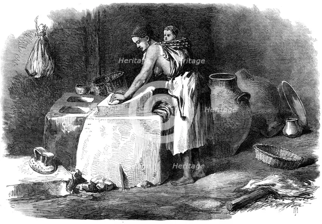 The Abyssinian Expedition: woman grinding corn in Tigre, 1868. Creator: Unknown.