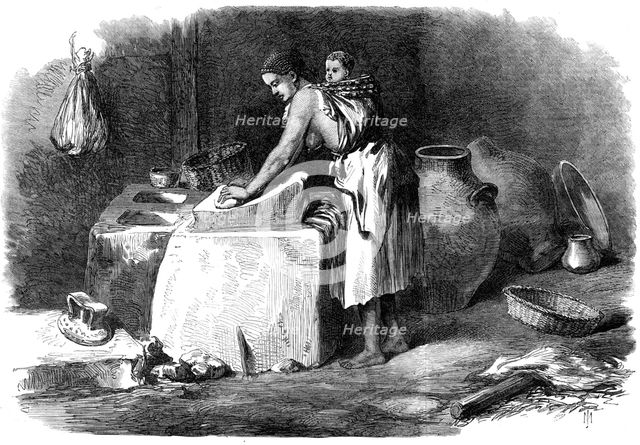 The Abyssinian Expedition: woman grinding corn in Tigre, 1868. Creator: Unknown.