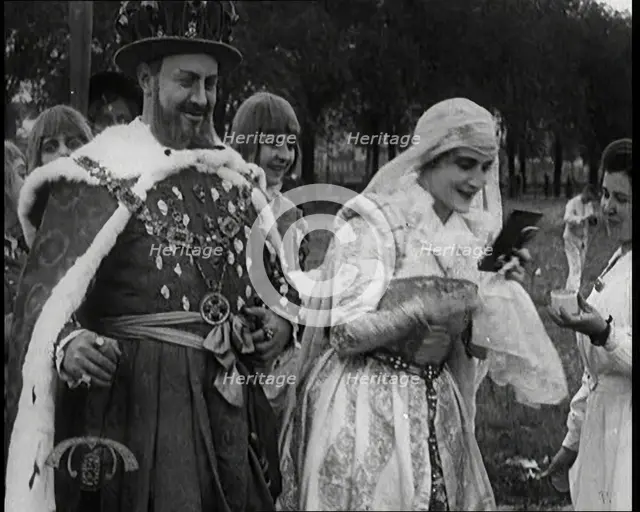 The Actor Henny Porten Dressed in Period Costume Putting on Make up from a Powder Compact..., 1920s. Creator: British Pathe Ltd.