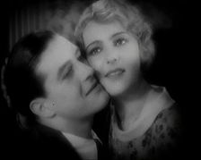 The Actor Ray Milland Embracing a Female British Actor, 1920s. Creator: British Pathe Ltd