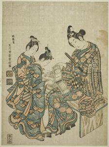 The Actor Sanogawa Ichimatsu I looking at a guidebook to the pleasure quarters, c. 1750. Creator: Ishikawa Toyonobu