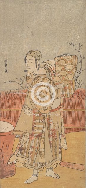 The Actor Sawamura Sojuro III Holding up a Piece of Brocade, late 18th century. Creator: Shunsho.
