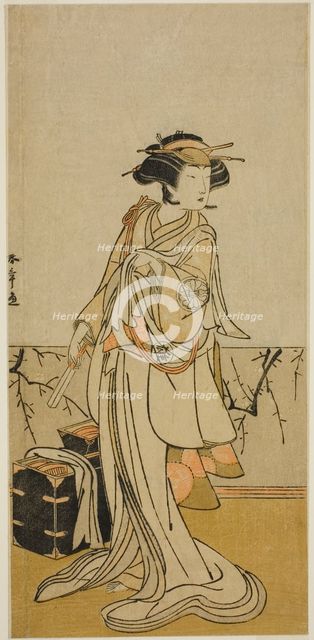 The Actor Segawa Yujiro I as Osai, a Female Hairdresser, in the Play Kamuri Kotoba Soga..., c. 1776. Creator: Shunsho.