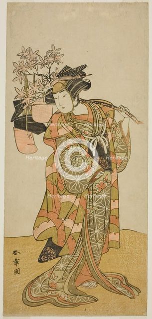 The Actor Yamashita Kinsaku II as Odai, an Eboshi (Hat) Seller, in the Play Hana-zumo..., c. 1775. Creator: Shunsho.