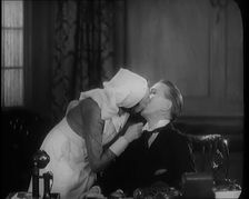 The Actors Sir Gerald Du Maurier and Benita Hulme Acting in a Play. They Kiss, 1931. Creator: British Pathe Ltd
