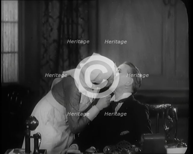 The Actors Sir Gerald Du Maurier and Benita Hulme Acting in a Play. They Kiss, 1931. Creator: British Pathe Ltd.