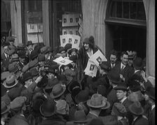 The Actress Violet Loraine Handing Out Leaflets to Hundreds of People Outside of a Theatre, 1920s. Creator: British Pathe Ltd