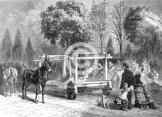 The American Centennial Exhibition at Philadelphia: transplanting trees in the grounds, 1876. Creator: Unknown.