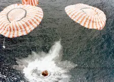 The Apollo 15 capsule lands safely despite a parachute failure, Mid-Pacific Ocean, 1971.Artist: NASA