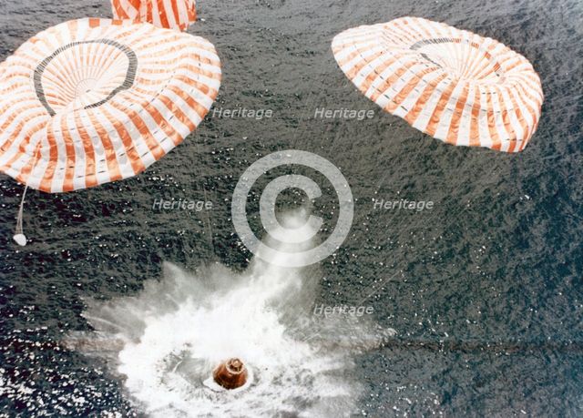 The Apollo 15 capsule lands safely despite a parachute failure, Mid-Pacific Ocean, 1971.Artist: NASA