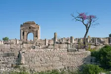 The Arch of Trajan and the Basilica of Hildeguns, Mactaris, Tunisia. Creator: Samuel Magal