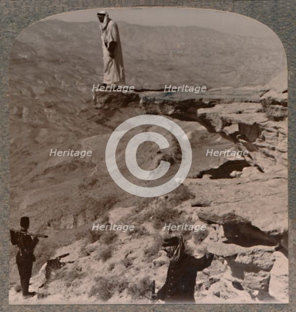 'The Arno. Dragoman standing on rock', c1900. Artist: Unknown.