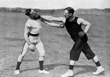 The art of boxing, the right under the chin Aldershot, Hampshire, 1896. Artist: Gregory & Co