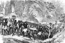 The Ashantee War: convoy of sick and wounded crossing a river on the road from Coomassie..., 1874. Creator: Unknown