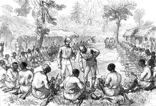 The Ashantee War: counting and inspecting ammunition of the Bonny men, 1874. Creator: Unknown