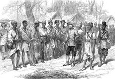 The Ashantee War: inspecting Kossohs at Prah-Su, from a sketch by our special artist, 1874. Creator: Unknown