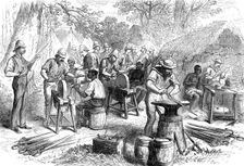 The Ashantee War: sharpening cutlasses...at Prah-Su, from a sketch by our special artist, 1874. Creator: Unknown