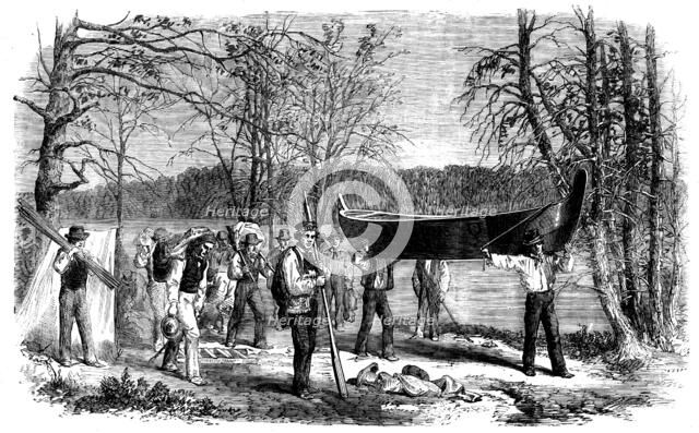 The Assiniboine and Saskatchewan Exploring Expedition - Portaging a Canoe and Baggage, 1858. Creator: Unknown.