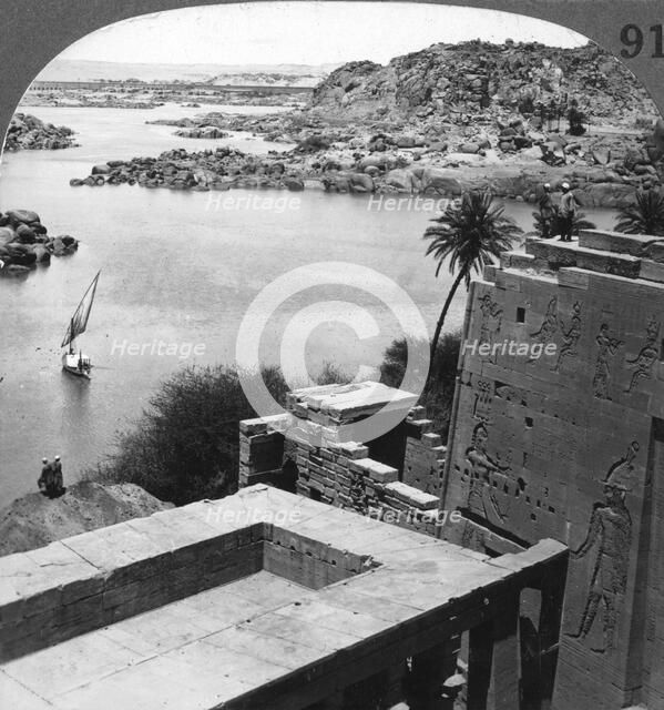 The Aswan dam as seen from the Philae temple, Egypt, 1905.Artist: Underwood & Underwood
