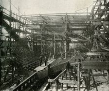 The Building of a War-Ship: A First-Class Cruiser in Progress at the Thames Ironworks (c1897). Artist: E&S Woodbury