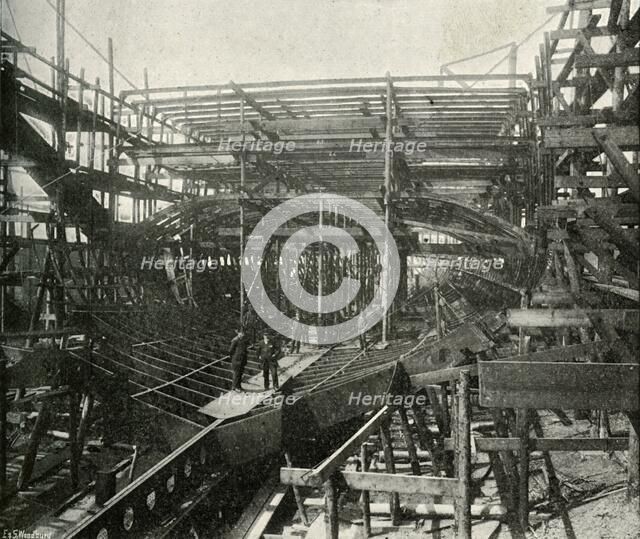 'The Building of a War-Ship: A First-Class Cruiser in Progress at the Thames Ironworks', (c1897). Artist: E&S Woodbury.