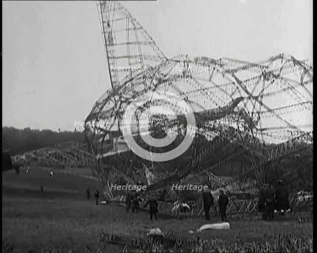 The Burnt Remains of the R-101 Airship Lying on the Ground After Fire and Destruction, 1930. Creator: British Pathe Ltd.