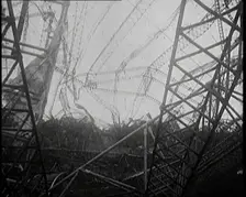 The Burnt Remains of the R-101 Airship Lying on the Ground After Fire and Destruction, 1930. Creator: British Pathe Ltd