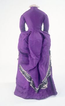 The back view of a fashionable day dress, c1875. Creator: Unknown