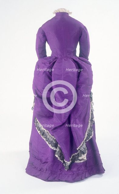 The back view of a fashionable day dress, c1875. Creator: Unknown.