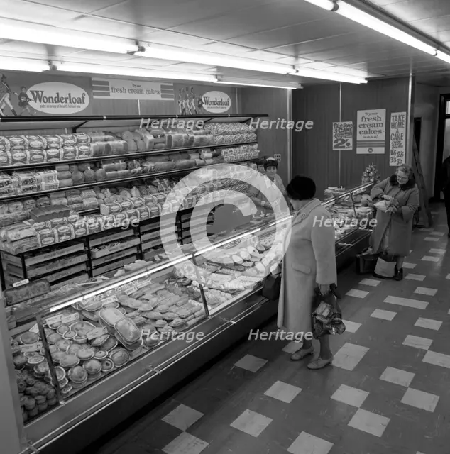 The bakery counter at the ASDA supermarket in Rotherham, South Yorkshire, 1969. Creator: Michael Walters.