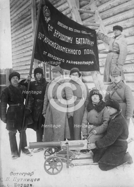 The banner of the Berdsk regional executive committee is held by the soldiers of the 3rd..., 1928. Creator: GP Putintsev.