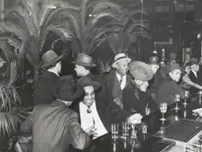 The bar at Palm Tavern, Negro restaurant on 47th Street, Chicago, Illinois, April 1941. Creators: Farm Security Administration, Russell Lee