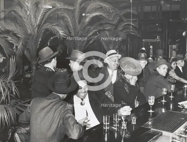 The bar at Palm Tavern, Negro restaurant on 47th Street, Chicago, Illinois, April 1941. Creators: Farm Security Administration, Russell Lee.
