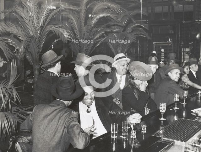 The bar at Palm Tavern, Negro restaurant on 47th Street, Chicago, Illinois, April 1941. Creators: Farm Security Administration, Russell Lee.