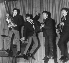 The Beatles playing around during rehearsals before the Royal Command Variety Performance, 1963