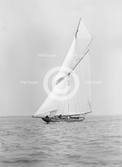 The beautiful 52 ft cutter 'Sonya' sailing close-hauled, 1913. Creator: Kirk & Sons of Cowes.