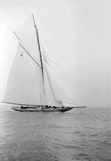 The beautiful 52 ft cutter Sonya sailing close-hauled, 1913. Creator: Kirk & Sons of Cowes