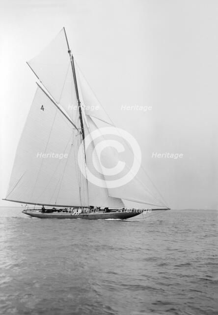 The beautiful 52 ft cutter 'Sonya' sailing close-hauled, 1913. Creator: Kirk & Sons of Cowes.