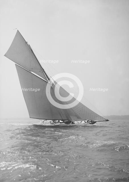 The beautiful 52 ft cutter 'Sonya' sailing close-hauled, 1913. Creator: Kirk & Sons of Cowes.