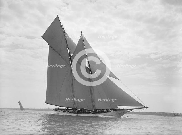The beautiful schooner 'Cetonia' making good headway, 1911. Creator: Kirk & Sons of Cowes.