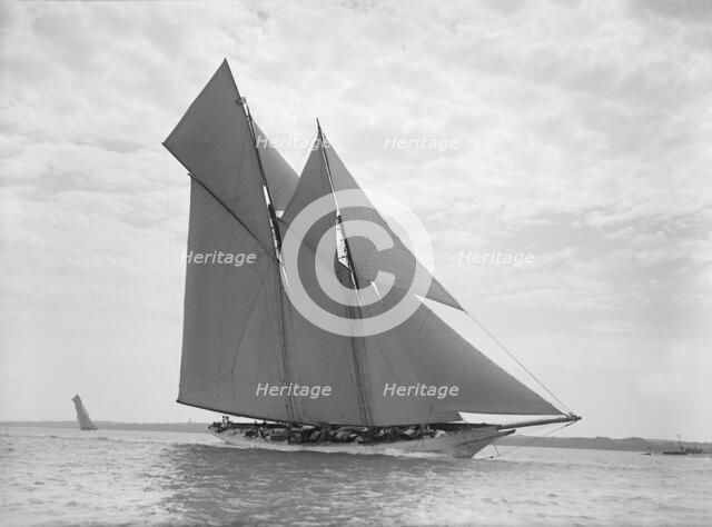 The beautiful schooner 'Cetonia' making good headway, 1911. Creator: Kirk & Sons of Cowes.