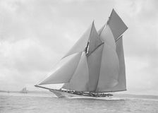 The beautiful schooner Cetonia making good headway, 1911. Creator: Kirk & Sons of Cowes