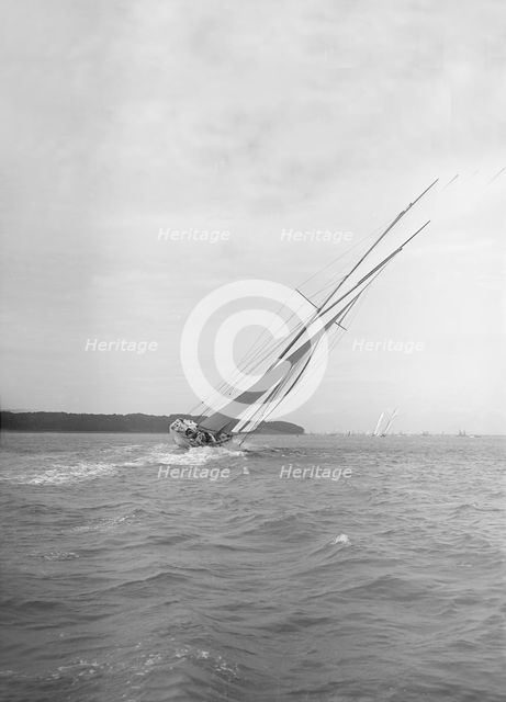 The Big Class 'White Heather II' heeling in a good wind, 1911. Creator: Kirk & Sons of Cowes.