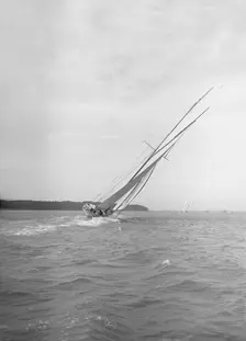 The Big Class White Heather II heeling in a good wind, 1911. Creator: Kirk & Sons of Cowes